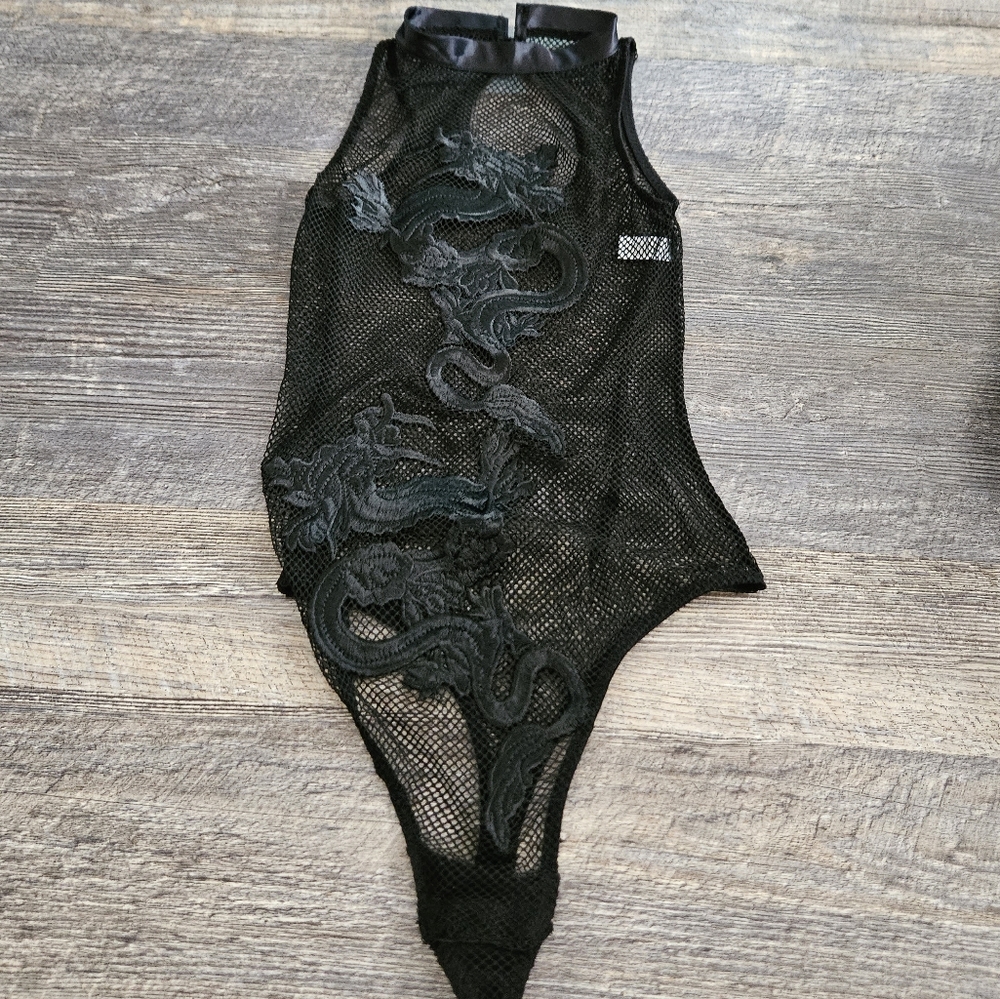Seduction by fedricks of Hollywood dragon fishnet bodysuit